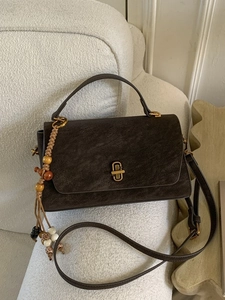 Retro dark brown suede handbag with golden twist lock and ethnic beaded tassel charm