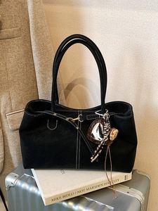 Retro black tote bag with white contrast stitching and heart charms for women