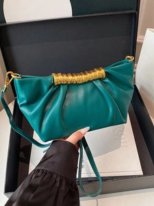 Minimalist teal pleated leather crossbody bag with elegant gold threaded metal handle