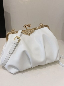 White pleated cloud shoulder bag with gold floral rhinestone clasp and crossbody strap