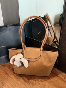 Brown retro tote bag in faux suede with leather straps and cute rabbit charm