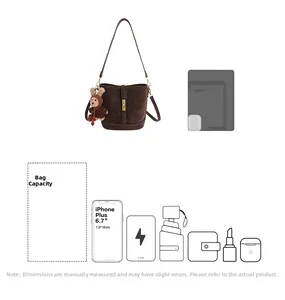 Capacité détaillée du sac seau marron foncé montrant le rangement du téléphone et objets