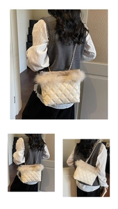 Close-up of white quilted tote bag featuring plush faux fur trim and metal chain strap