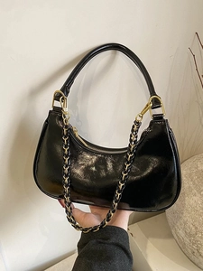 Retro black patent leather hobo bag with gold chain strap and glossy mirror finish