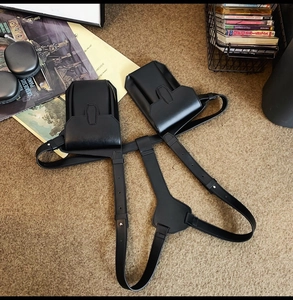 Tactical black PU leather harness with small flap pouches and metal rivet details