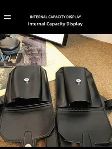 Detail view of black PU leather luggage tag interior showing magnetic buckle and compartment