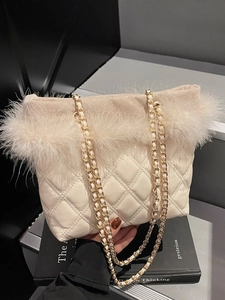 Chic beige quilted shoulder bag with faux feather trim and elegant chain strap for women