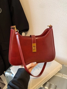 Chic burgundy leather underarm shoulder bag with gold metal lock for women's daily fashion