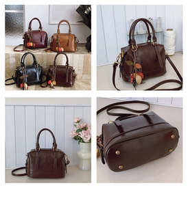 Details von Retro-Boston-Handtaschen in vier Farben mit Anhängern und Bodennägeln aus Metall