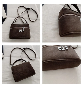 Détails du sac à main vintage marron foncé en similicuir avec fermoir rotatif argenté