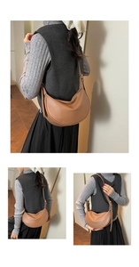 Close-up of brown lychee grain leather moon bag with gold metal buckle detail