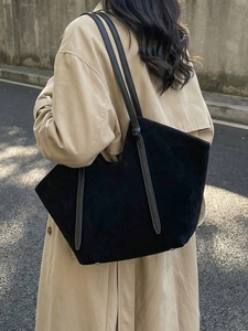 Minimalist large black suede tote bag for women, stylish oversized shoulder bag in street view