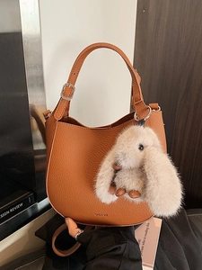 Retro brown bucket bag in lychee pattern faux leather with cute plush rabbit charm
