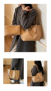 Detail view of large camel tote bag and matching inner pouch with pebbled texture
