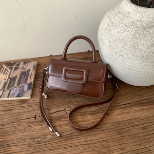 Retro dark brown square crossbody bag with glossy leather and large buckle detail