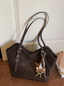 Large dark brown tote bag in textured faux suede with silver buckles and a cute bear charm