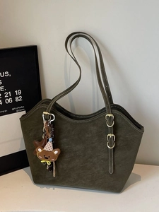 Olive green suede tote bag with wave-edge design and cute bear charm for winter commute