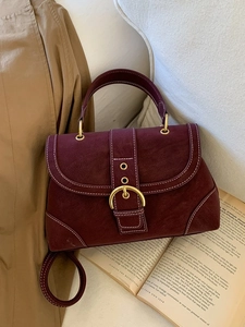 Vintage burgundy suede handbag with gold ring buckle and white stitching for women