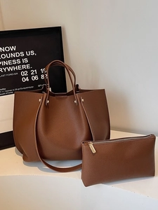 Brown lychee grain leather tote bag set for women with matching zipper pouch and top handles
