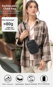 Close-up of black lychee pattern PU mini chest bag weighing 80g for 6.5-inch phone