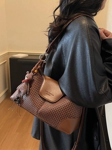 Brown woven suede hobo bag for women with leather trim and a cute bear charm