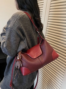 Burgundy woven suede shoulder bag for women with bear pendant and adjustable strap