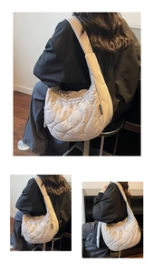 Detail of beige quilted crescent shoulder bag showing soft texture and strap design