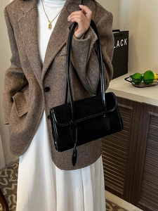 Retro black suede underarm bag with leather trim and long straps for commuter fashion
