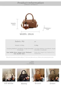 Detail view of mini Boston bag showing PU material texture and small bear pendant