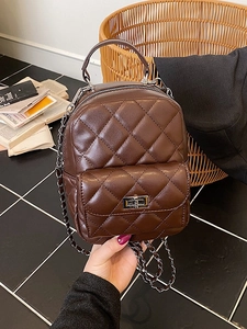 Dark brown quilted mini backpack for women with chain strap and silver twist lock