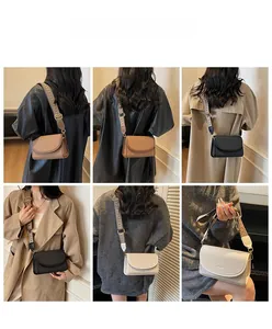 Modèle portant un sac à bandoulière minimaliste avec une large sangle jacquard en trois tons