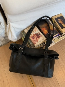 Large black lychee pattern leather tote bag with adjustable straps and silver buckles