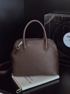 Brown litchi leather shell handbag with twin handles and detachable crossbody strap
