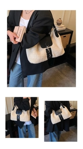 Detail of soft faux fur tote bag featuring a black leather flap and silver metal chain