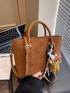 Retro brown suede bucket bag with teddy bear charm and adjustable strap for women