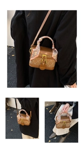 Retro brown quilted box bag with silk scarf handle detail and gold hardware accents