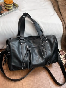Retro black litchi pattern pillow bag with multi-zipper pockets and silver rivets