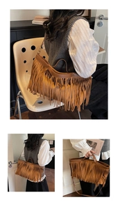 Gros plan sur un cabas vintage marron foncé avec franges denses et quincaillerie rétro