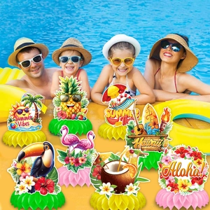 Hawaii themed tropical summer party honeycomb centerpieces with flamingos and pineapples