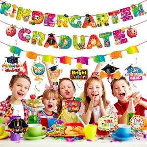 Detail of Kindergarten Graduate banner with hanging swirls for school graduation party