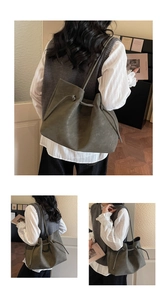 Detail view of large olive green matte suede tote bag with adjustable drawstring closure