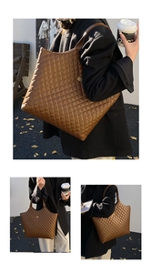 Detail of caramel brown quilted tote bag with golden clover metal hardware for winter fashion