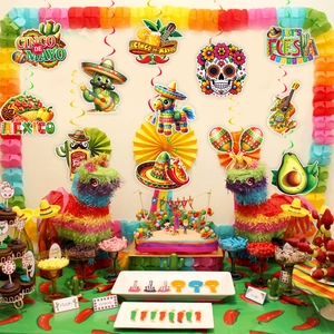 Vibrant Cinco de Mayo party decorations with taco banner and cactus paper cutouts