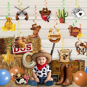 Western cowboy party decorations featuring spiral hanging swirls and cactus boot badges