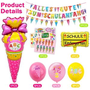 Detail of school party set with candy foil balloon and colorful latex balloons
