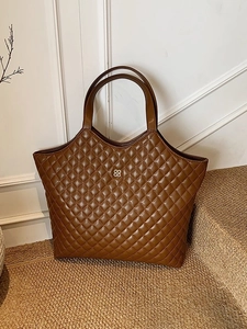 Dark brown large capacity tote bag with quilted diamond pattern and golden clover logo