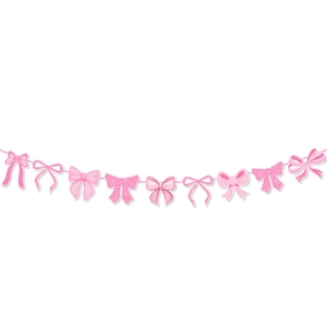 Close-up of pink glitter bow party banners and hanging decorations for baby showers