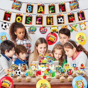 Detail of Back to School party set including banner, cake toppers and balloons