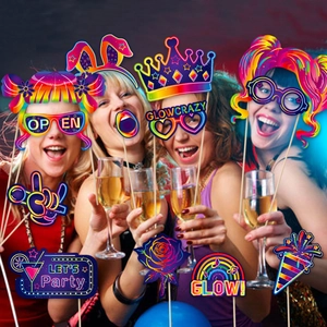 Neon glow party photo booth props set held by models for vibrant night celebration events