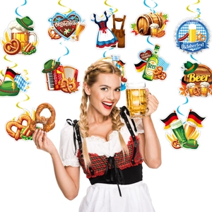 Detail of Oktoberfest party hanging swirls with beer mugs and pretzel cardboard cutouts